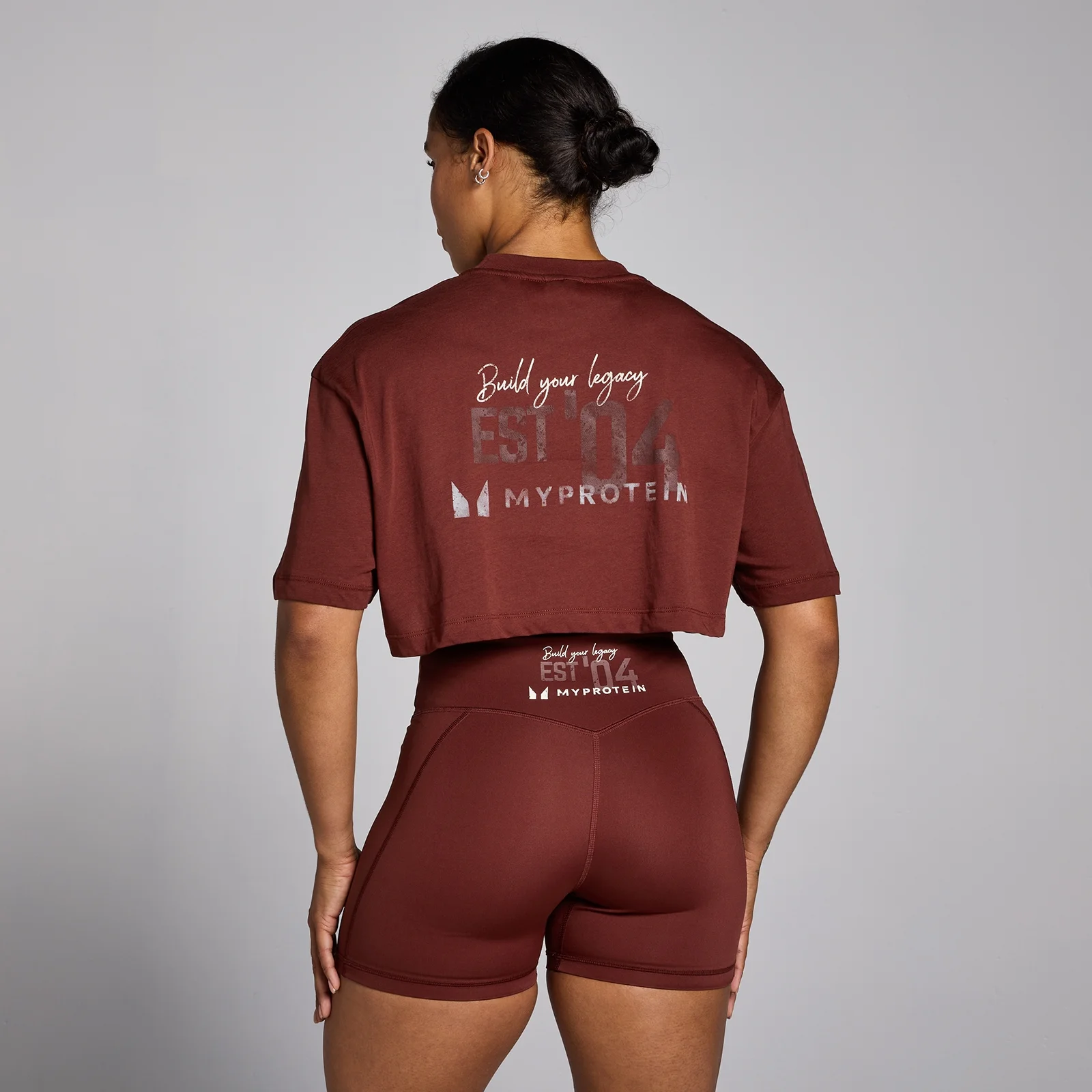 MP ženska Origin Graphic podrezana majica - boja crvene cigle - XS Slika 1